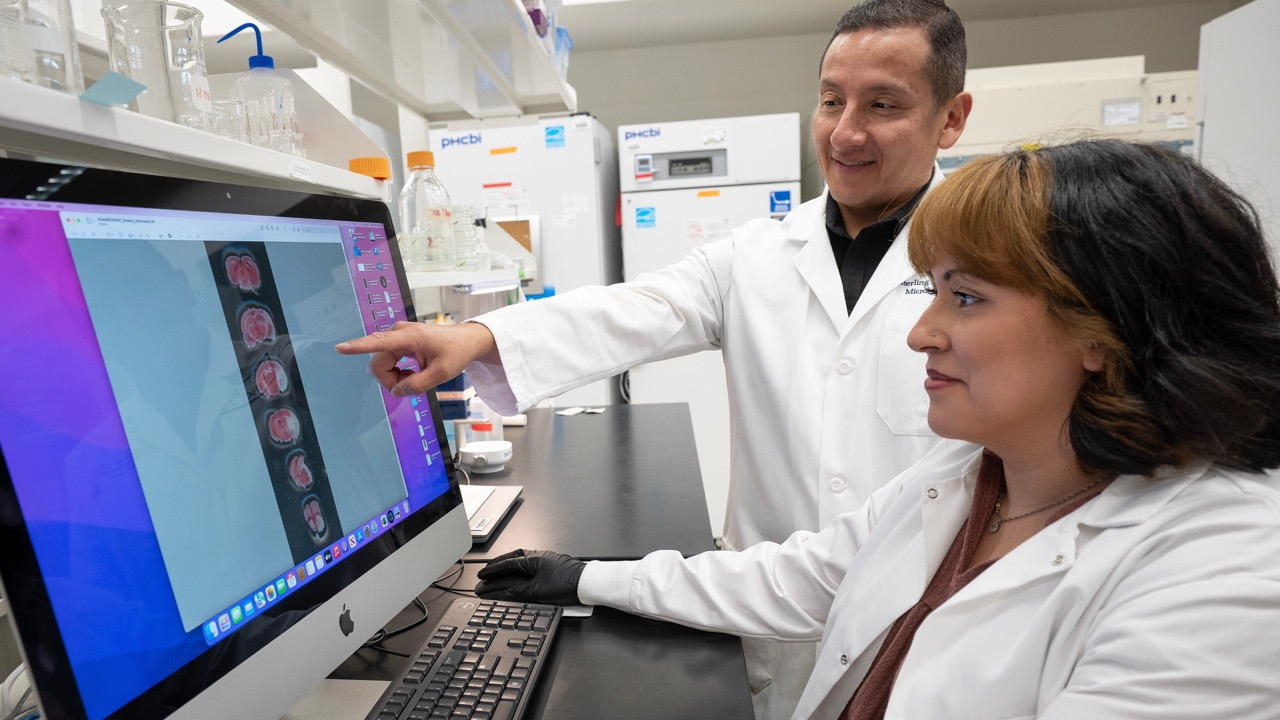 CBTS Student and Faculty member in lab