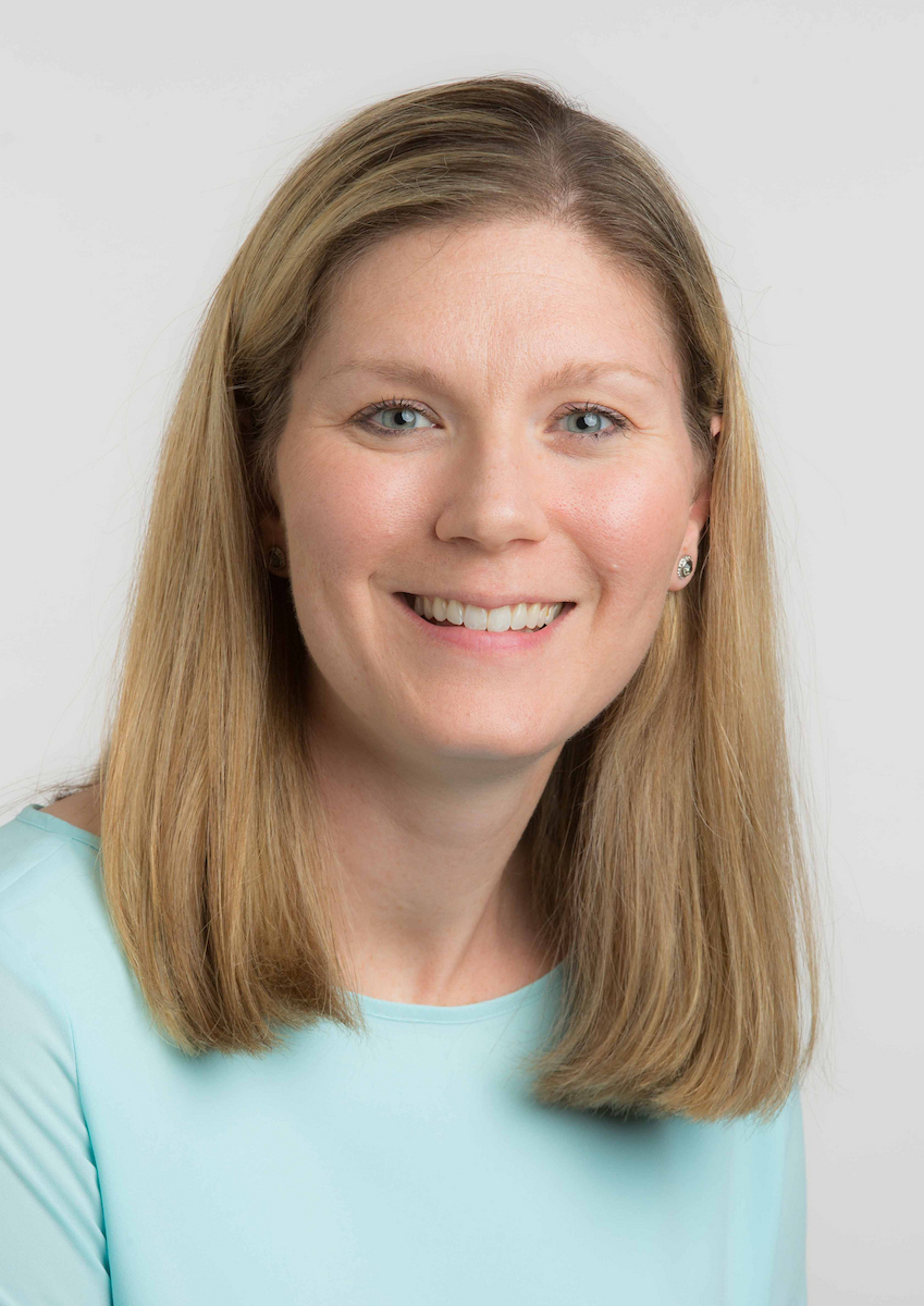 Lauren Dobbs headshot wearing a light blue shirt