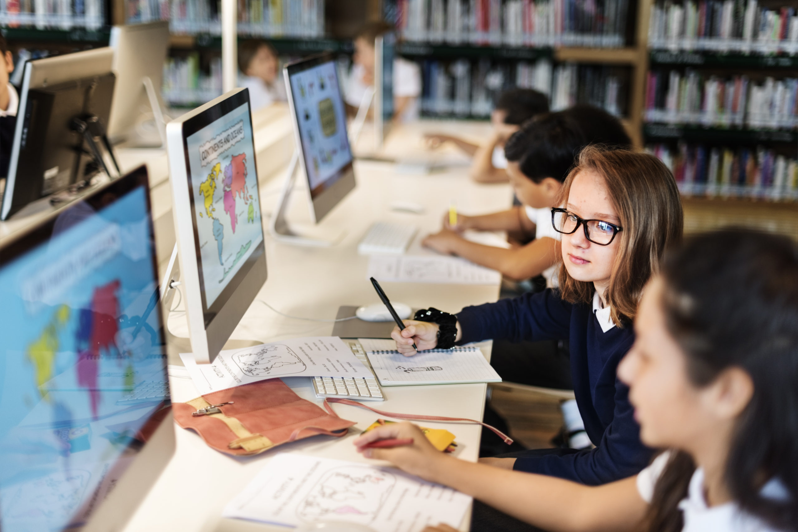 Children using computers for classwork