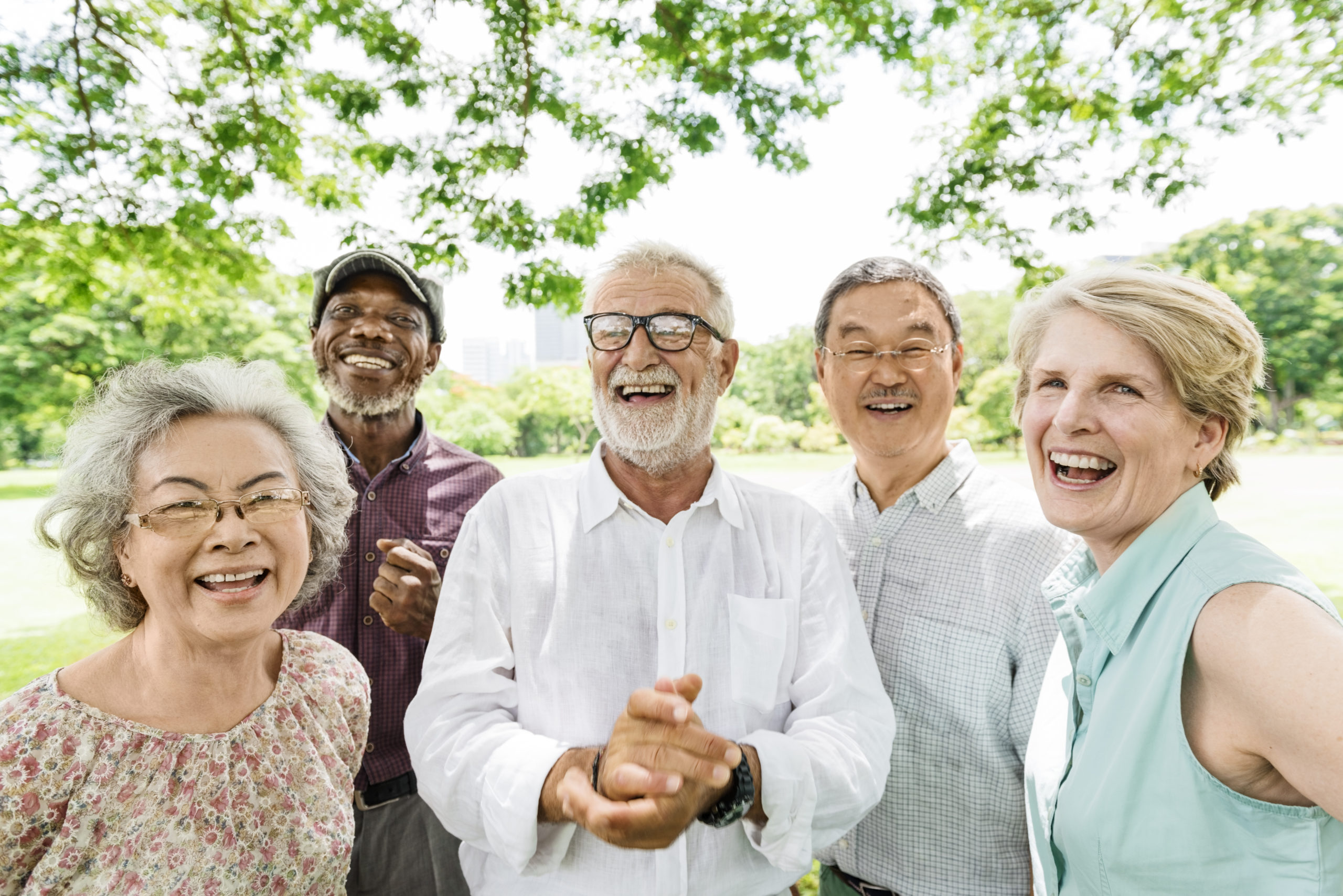 Older adults laughing outside