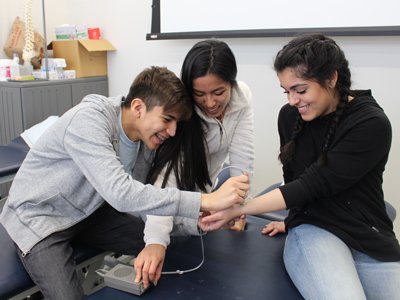 Group of students testing in a lab