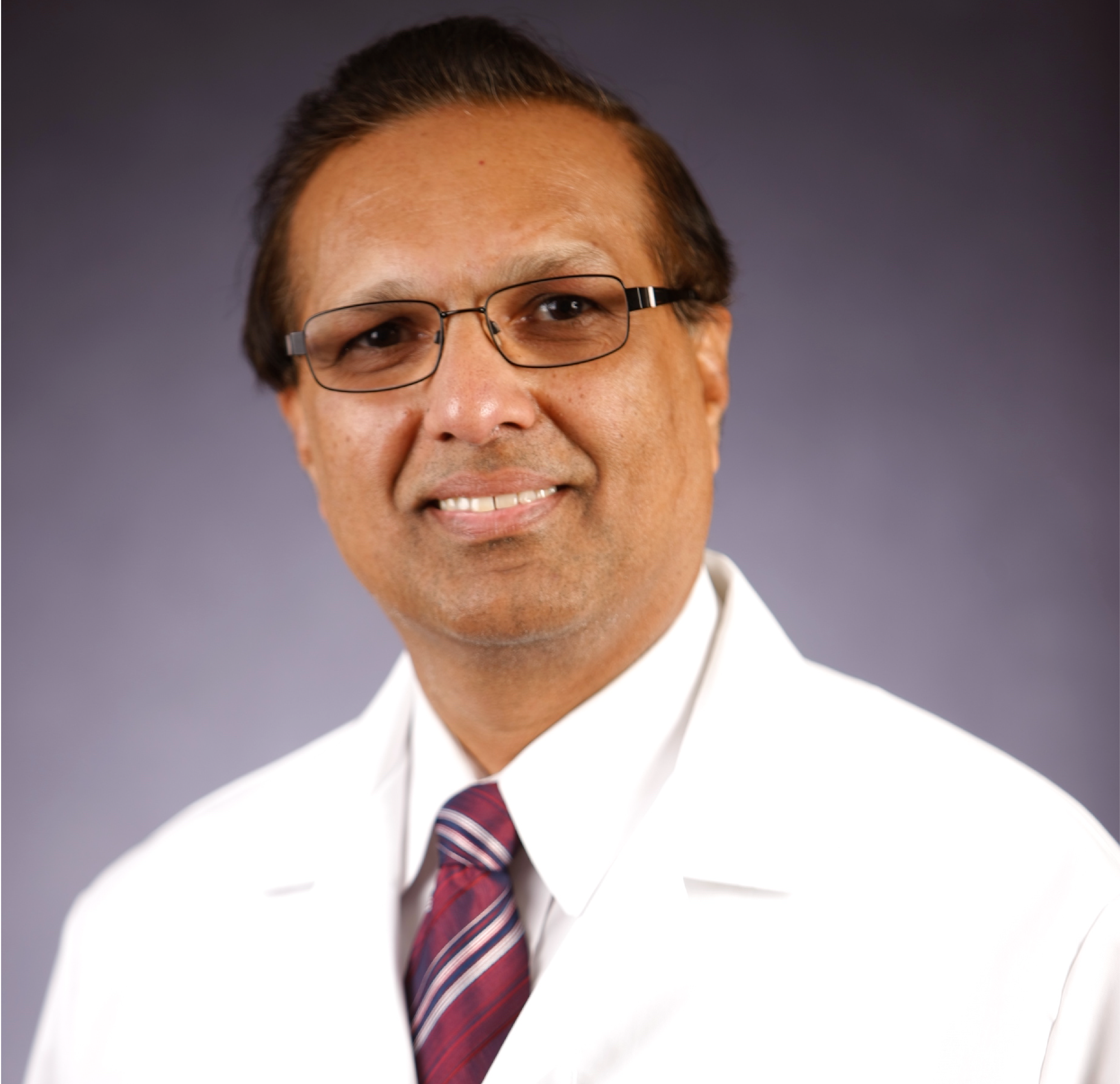 Dr. Vishwanatha headshot with his white coat 