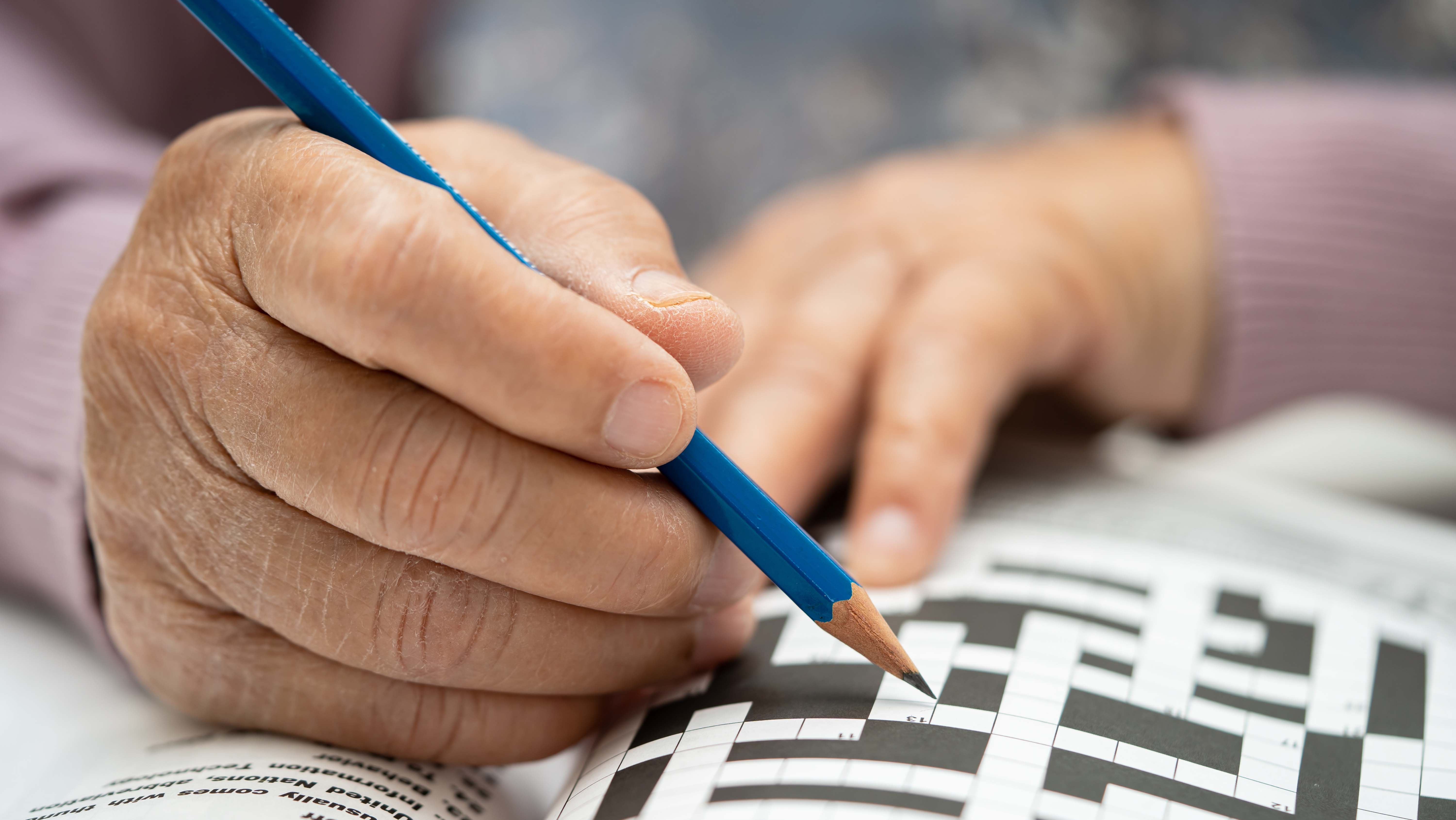 Patient working a crossword